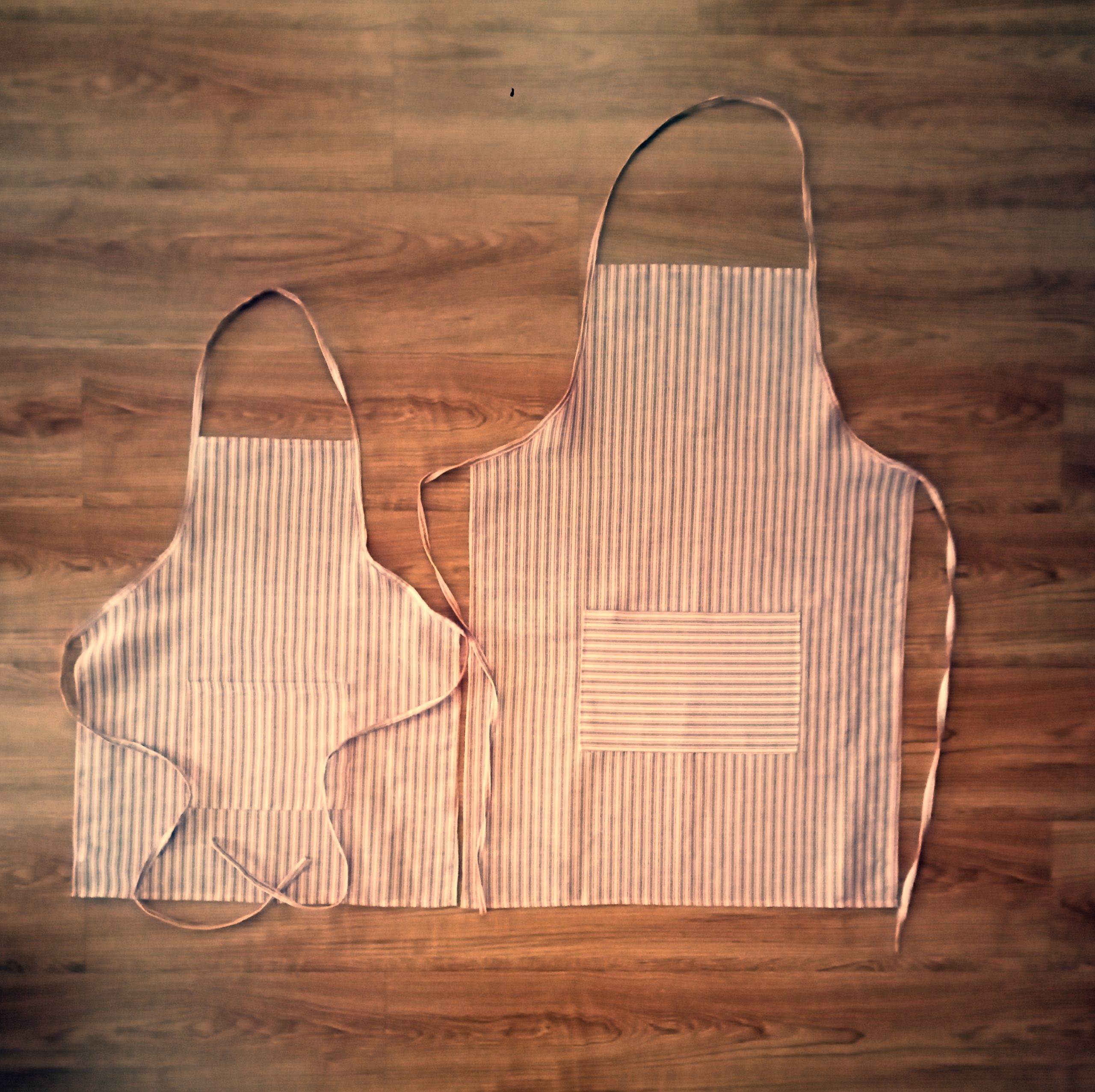 Mommy and me apron set in red candy stripe with a pocket